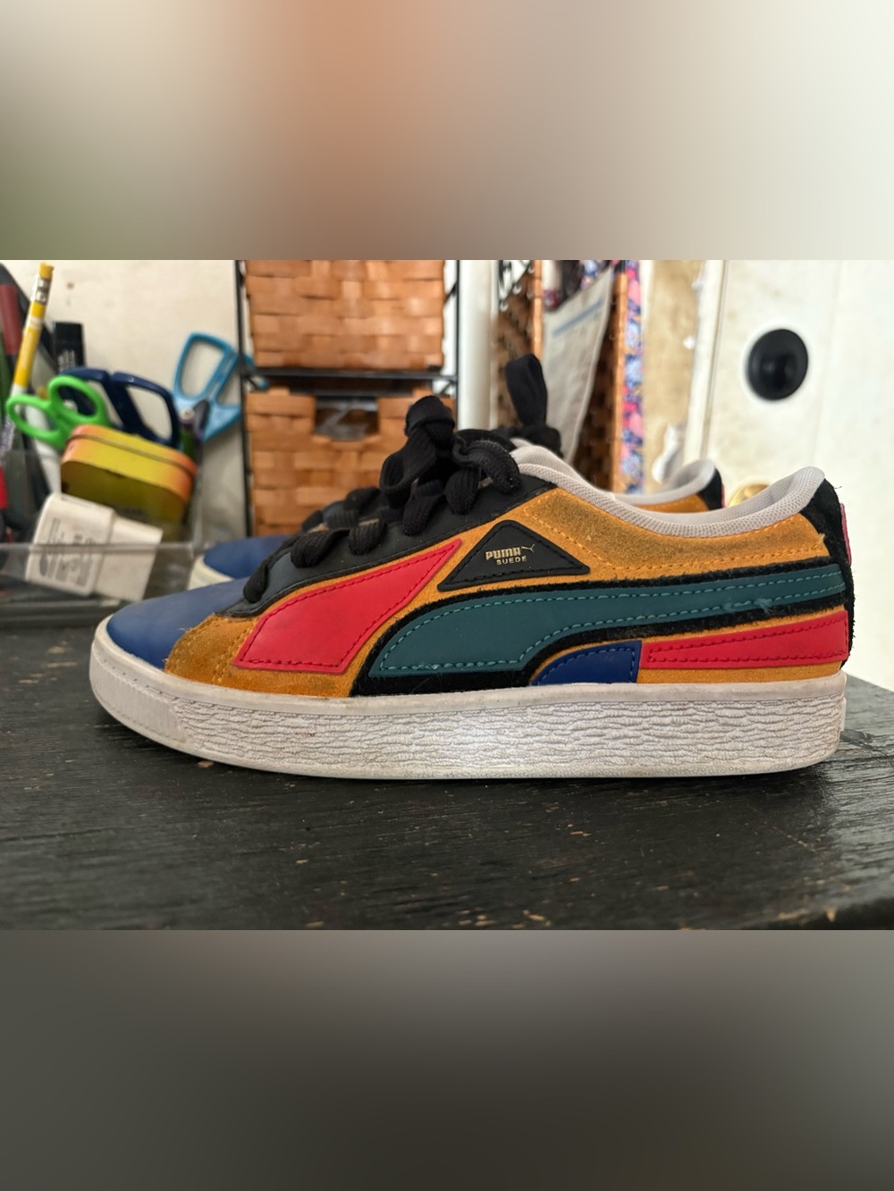 Puma multi-colored shoes.